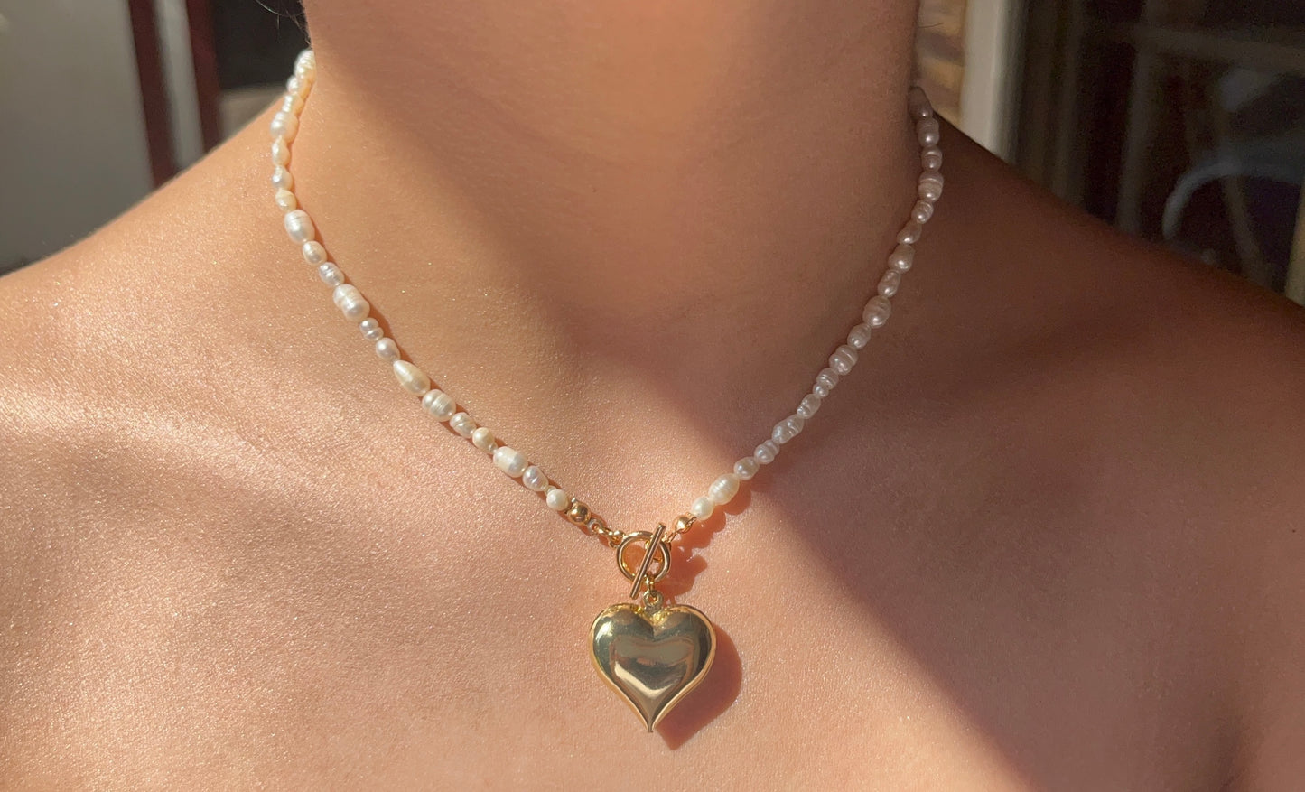 שרשרת פנינים ותליון לב